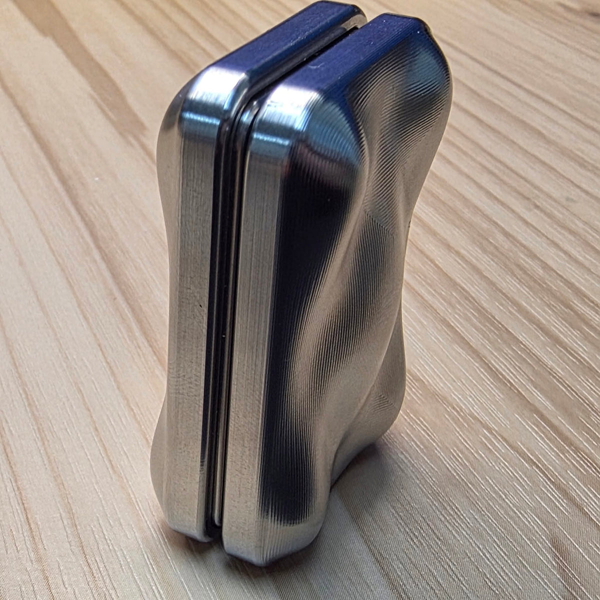 J&L EDC NEMO Stainless Steel slider standing side view